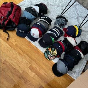 A lot of 80+ hats and a Jordan backpack